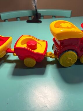 Source Unknown Red and Yellow Pull-Along Toy Train